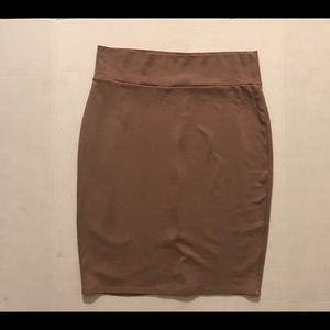 Charlotte Russe Nude Skirt in a size L. Never worn